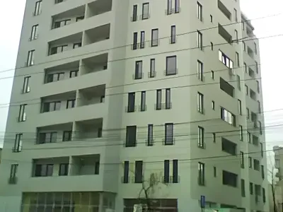 Bloc inalt si alb apartament de inchiriere Sector 5, București